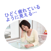 頭痛があって疲れているように見える女性の画像